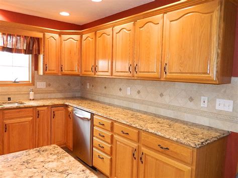 steel grey granite with honey oak cabinets|ganache granite with oak cabinets.